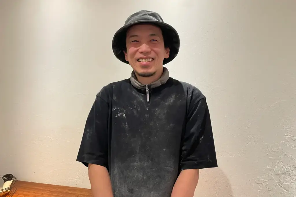 店主の小塚章彦さん
