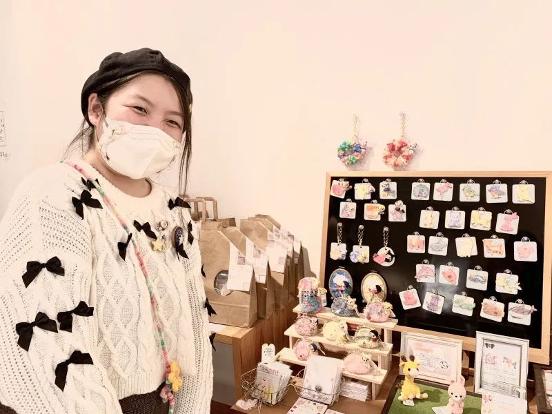 〇〇な人々展　主催者