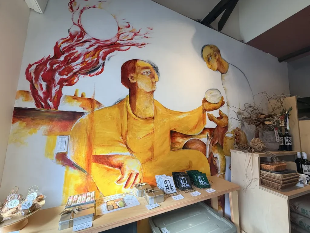 「ACベーグルズ」の店内の壁画